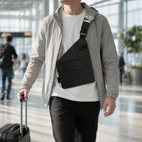 Sling worn in front at an airport thumbnail
